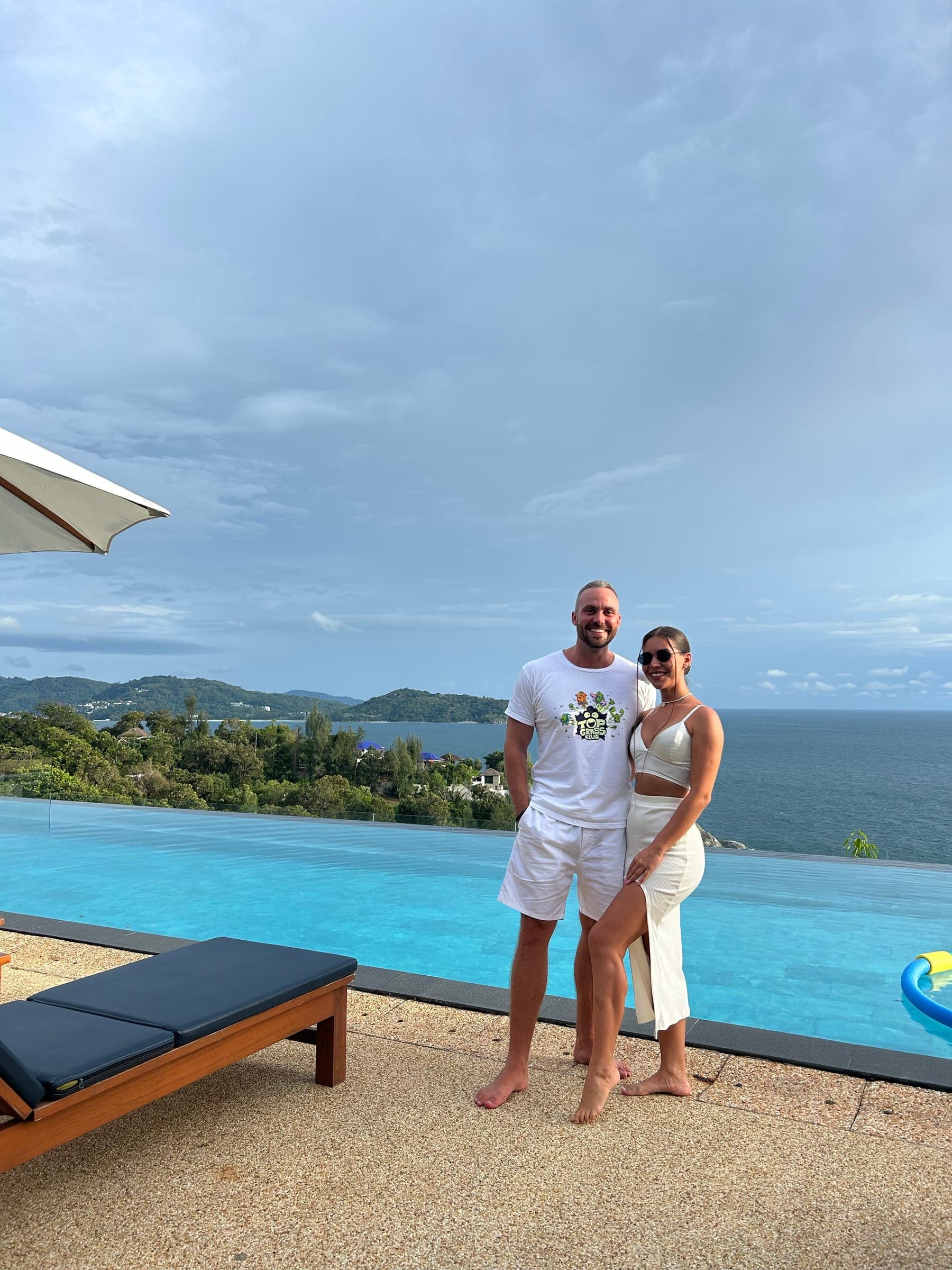 Luca & Albina at an infinity pool above the sea