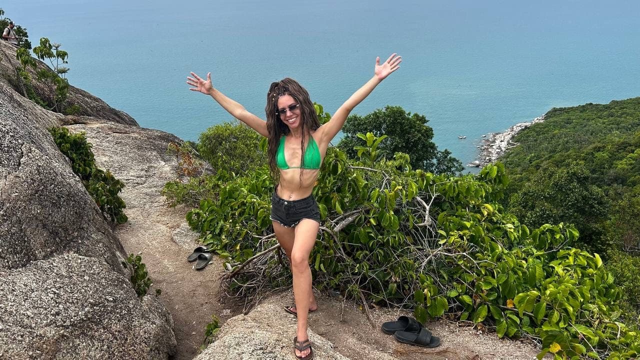 Albina at a viewpoint high above the sea